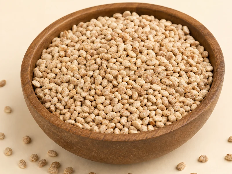 Buchanania lanzan charoli kernels in a wooden bowl