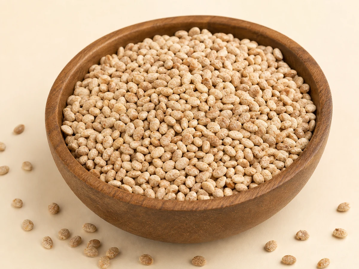 Real Buchanania lanzan chironji or charoli kernels in a wooden bowl